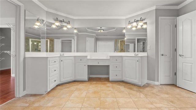 bathroom featuring tile patterned flooring and ornamental molding