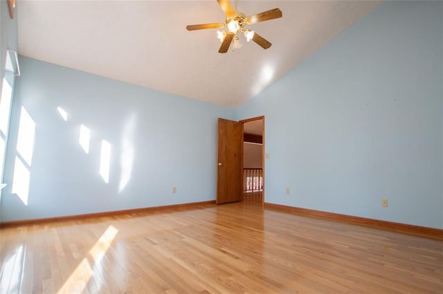 unfurnished room featuring ceiling fan, light hardwood / wood-style flooring, and high vaulted ceiling