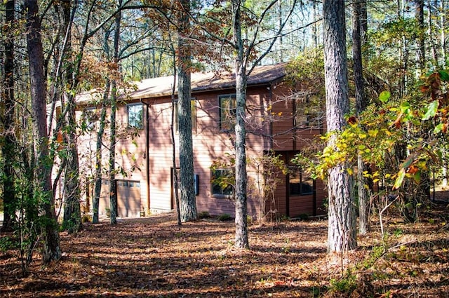 exterior space with a garage