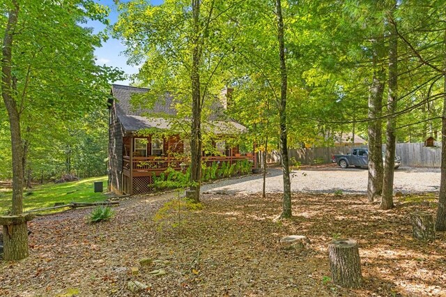 view of yard featuring a wooden deck