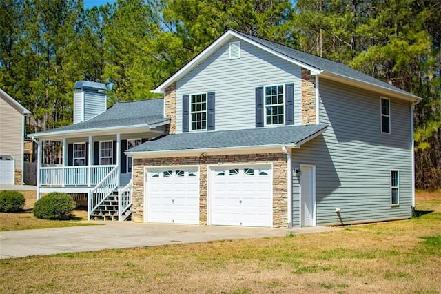 view of front of home featuring stone siding, covered porch, concrete driveway, a front yard, and an attached garage