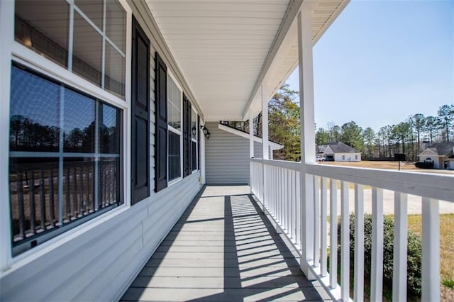 balcony featuring a porch