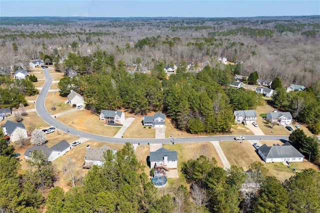 drone / aerial view with a forest view