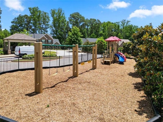 community jungle gym with fence