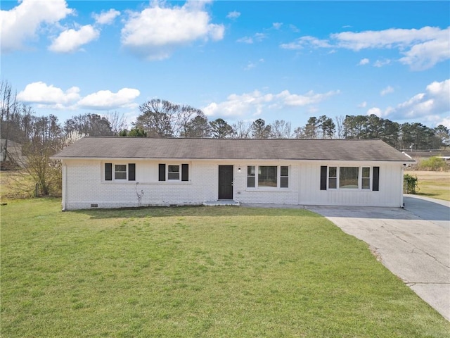 single story home with brick siding, concrete driveway, and a front yard