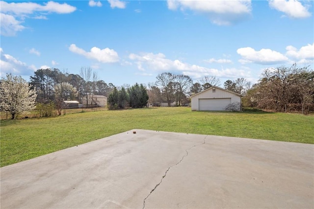 exterior space with a garage and an outdoor structure