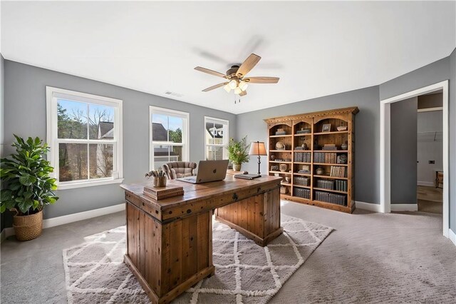 bedroom featuring ceiling fan and light carpet