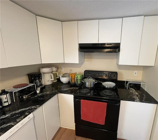 kitchen with black range with electric stovetop, under cabinet range hood, white cabinets, and wood finished floors
