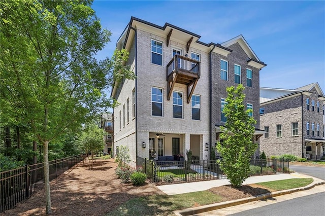 408 Townly Ct, Alpharetta, GA 30009 - view of front facade with a balcony and brick siding