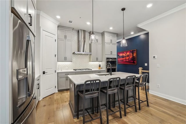 408 Townly Ct, Alpharetta, GA 30009 - kitchen with wall chimney range hood, appliances with stainless steel finishes, a sink, light countertops, and backsplash