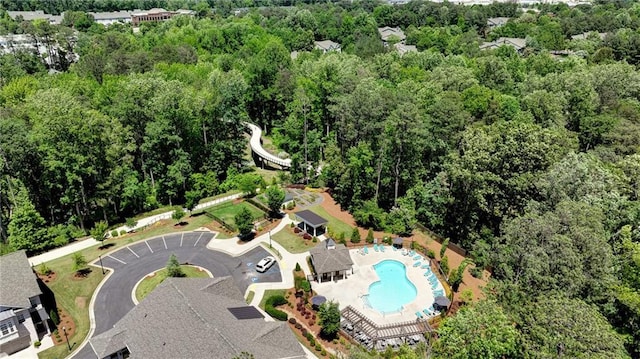 408 Townly Ct, Alpharetta, GA 30009 - bird's eye view of a pool area and a heavily wooded area