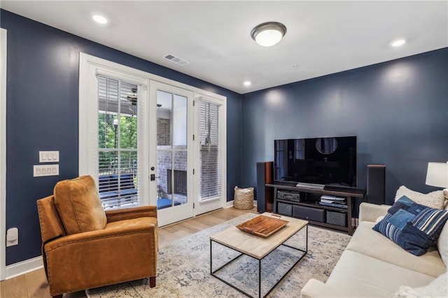 408 Townly Ct, Alpharetta, GA 30009 - living room featuring french doors, wood finished floors, baseboards, and recessed lighting