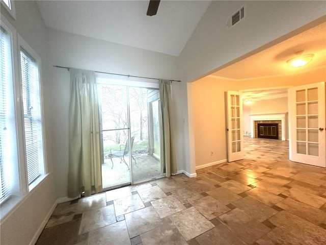 doorway to outside featuring baseboards, french doors, visible vents, and a healthy amount of sunlight