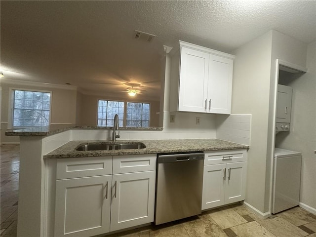 kitchen with visible vents, dishwasher, light stone countertops, white cabinetry, and a sink