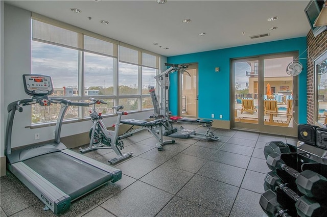 exercise room featuring recessed lighting