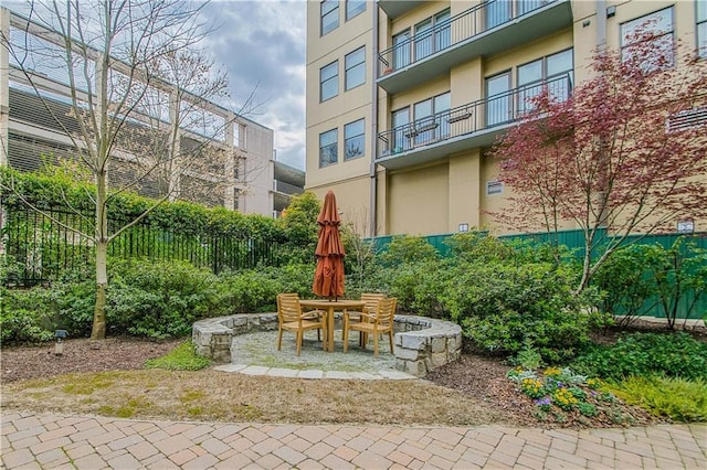 surrounding community with a patio