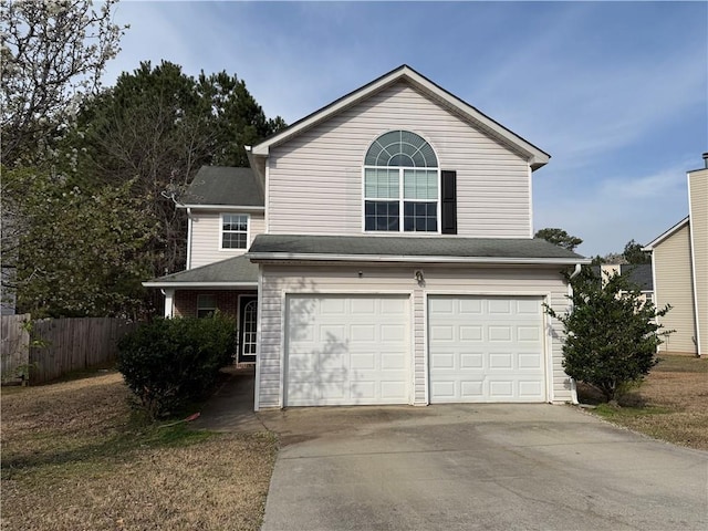 2625 Thunder Basin Way, Douglasville, GA 30135 - traditional home with an attached garage, fence, a shingled roof, and driveway