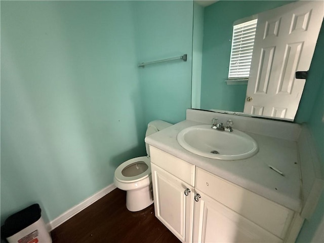 2625 Thunder Basin Way, Douglasville, GA 30135 - half bath with toilet, wood finished floors, vanity, and baseboards