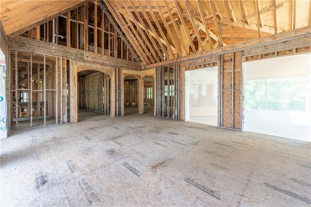 misc room with high vaulted ceiling