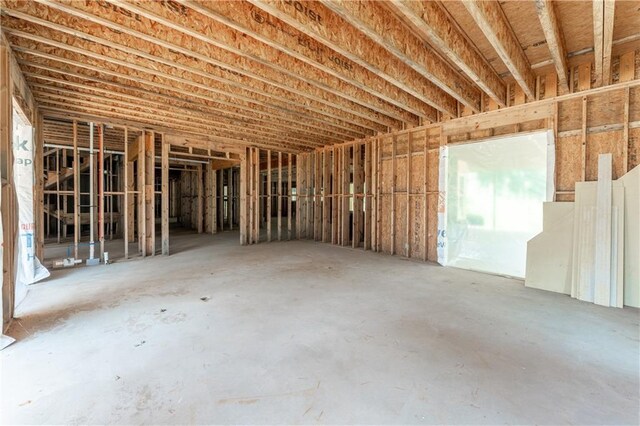 misc room with concrete floors