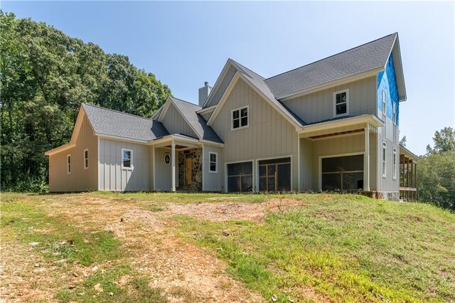 view of front of home with a front yard