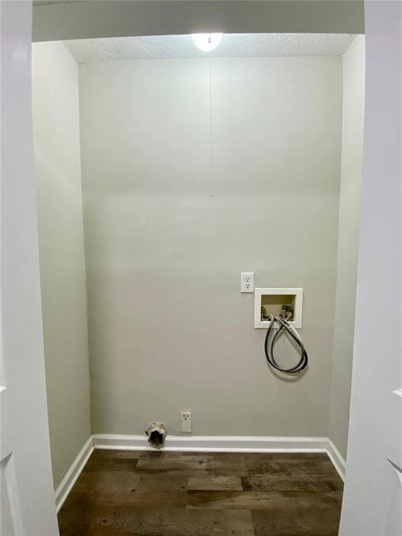 laundry area featuring washer hookup, hardwood / wood-style floors, electric dryer hookup, and a textured ceiling