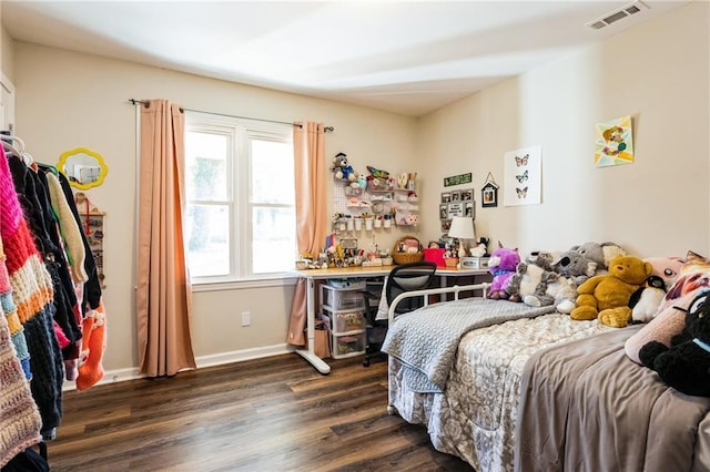 bedroom featuring dark hardwood / wood-style floors