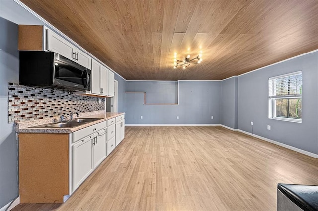 kitchen with light wood-type flooring, backsplash, wood ceiling, and white cabinets