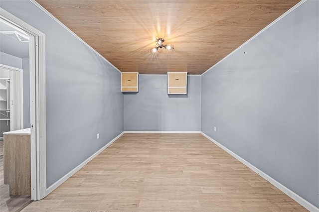 bonus room featuring wood ceiling, visible vents, baseboards, and wood finished floors