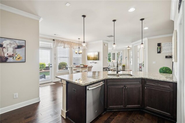 4155 Brookview Dr, Cumming, GA 30040 - kitchen with stainless steel dishwasher, a sink, crown molding, dark brown cabinetry, and baseboards