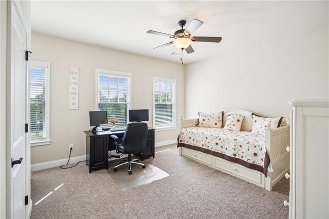 4155 Brookview Dr, Cumming, GA 30040 - carpeted bedroom with a desk, baseboards, and a ceiling fan