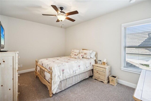 4155 Brookview Dr, Cumming, GA 30040 - bedroom with light carpet, baseboards, and a ceiling fan