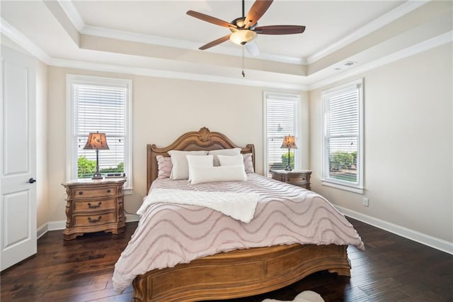 4155 Brookview Dr, Cumming, GA 30040 - bedroom featuring a raised ceiling, multiple windows, dark wood finished floors, crown molding, and baseboards