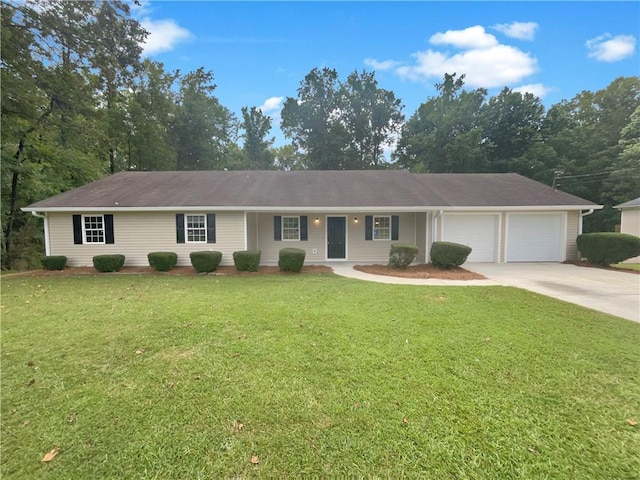 single story home featuring a garage and a front yard