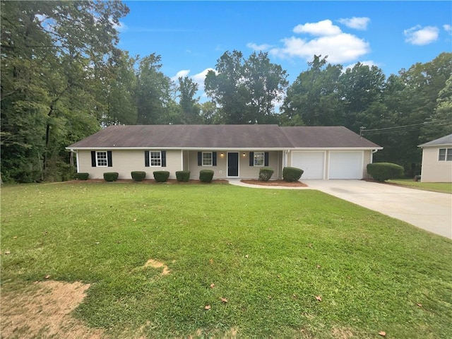 ranch-style house with driveway, a front lawn, and a garage