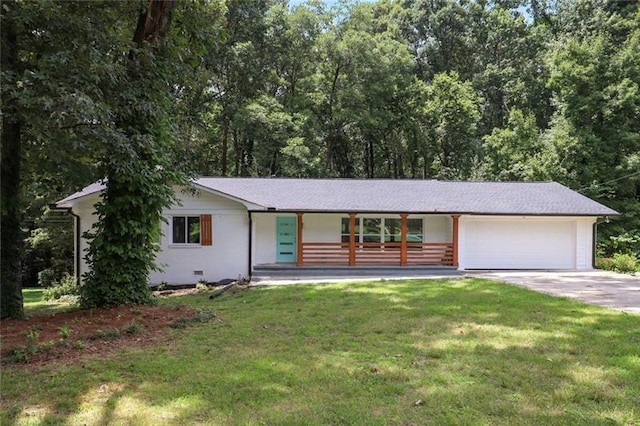 ranch-style house with covered porch, driveway, a front lawn, and a garage