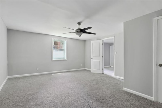 unfurnished bedroom featuring baseboards, ceiling fan, and carpet flooring