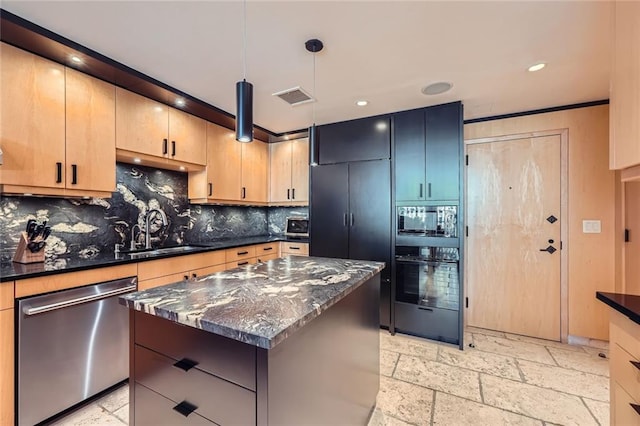 147 15th St NE Unit 16C, Atlanta, GA 30309 - kitchen with visible vents, stone tile floors, tasteful backsplash, a sink, and stainless steel appliances