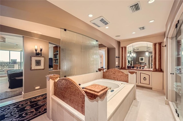 147 15th St NE Unit 16C, Atlanta, GA 30309 - ensuite bathroom with visible vents, connected bathroom, and a bath