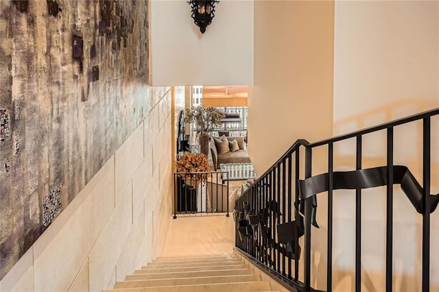 147 15th St NE Unit 16C, Atlanta, GA 30309 - staircase featuring a towering ceiling
