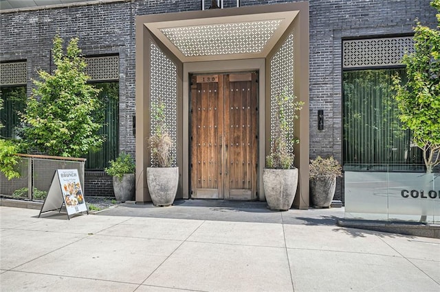 147 15th St NE Unit 16C, Atlanta, GA 30309 - property entrance featuring brick siding