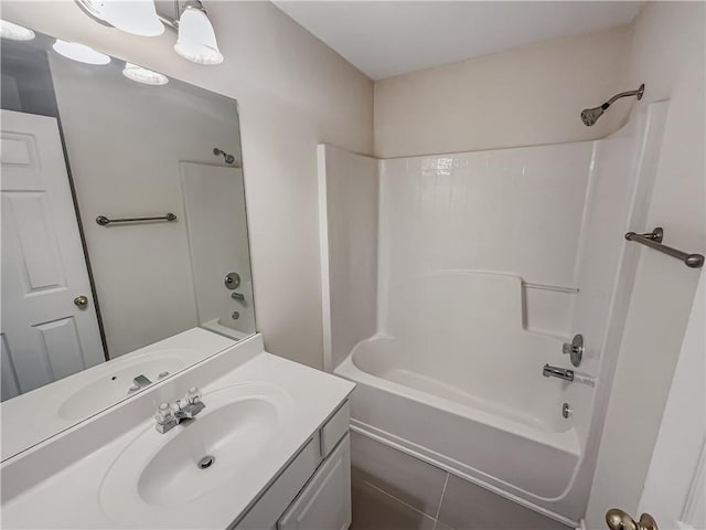 bathroom with bathing tub / shower combination and vanity