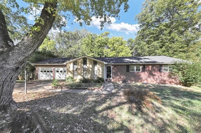 ranch-style house featuring a garage