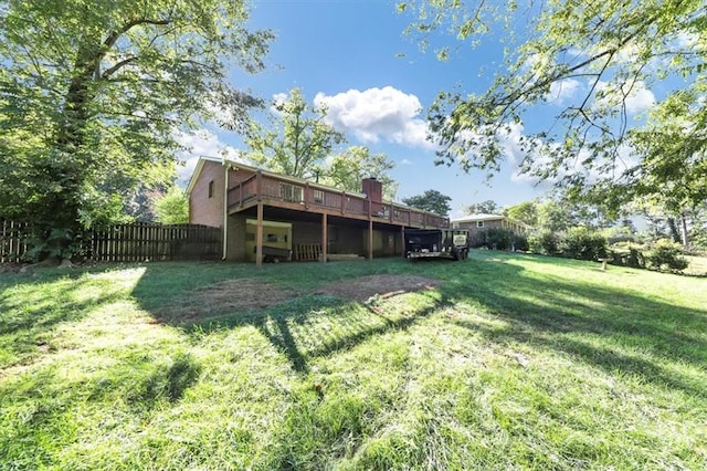 view of yard with a deck