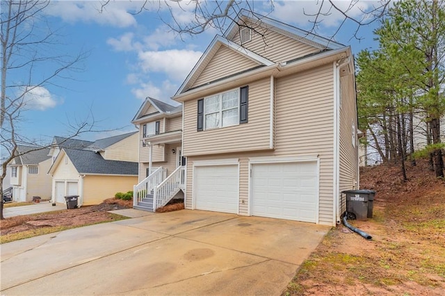 view of front of property featuring driveway and an attached garage