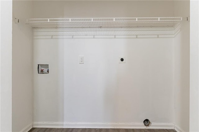 laundry area featuring laundry area, hookup for a washing machine, baseboards, and hookup for an electric dryer