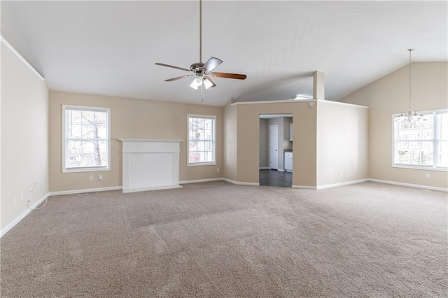 unfurnished living room featuring vaulted ceiling, carpet flooring, a ceiling fan, and baseboards