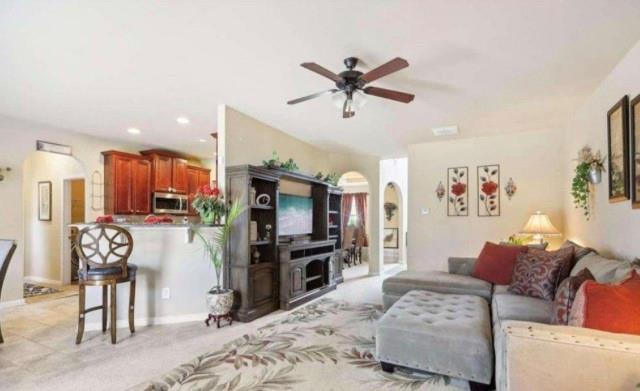 carpeted bedroom featuring vaulted ceiling