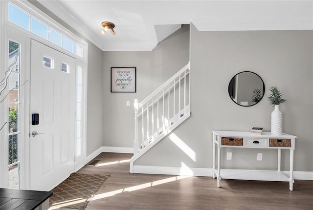 5990 Eagle Tiff Ln, Sugar Hill, GA 30518 - foyer entrance featuring ornamental molding, wood finished floors, and stairway