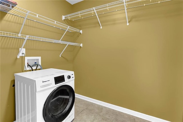 laundry room featuring washer / dryer